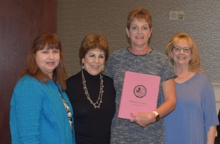 Janie DeJesus, Director of Awards, Mary Garrison, President, Karen Barret, President Elect pictured with Melinda Cordova, Secretary and her new pink binder.