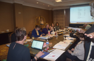 The Board working hard on the day’s agenda work.