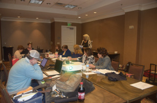 The Board working hard on the day’s agenda work.